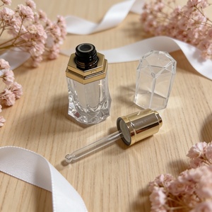 Botella de Aceite Transparente de Plástico Acrílico de Lujo de 10 ml con Gotero Dorado para Aceite Esencial - Product Image 1