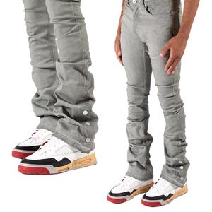 Jeans en denim gris de luxe pour hommes, style évasé, boutons-pression, personnalisés, effet empilé et déchiré - Product Image 1