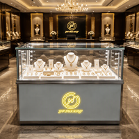 Vitrine de présentation de bijoux de luxe moderne avec éclairage LED, miroir écologique, dimensions personnalisées pour les magasins de détail et les centres commerciaux