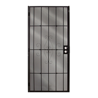 Porte d'entrée principale double avec grille et imposte latérale en fer forgé à vendre