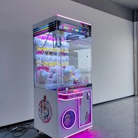 Machine à attraper les peluches commerciale, très populaire, entièrement transparente, grande, en plastique, avec garantie d'un an, à monnayeur, pour aire de jeux, modèle anglais