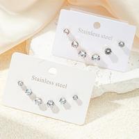 Pendientes de tuerca de acero inoxidable con circonitas engastadas en forma de garra, juego de pendientes pequeños, juego de tres piezas de pendientes de tuerca redondos con circonitas.