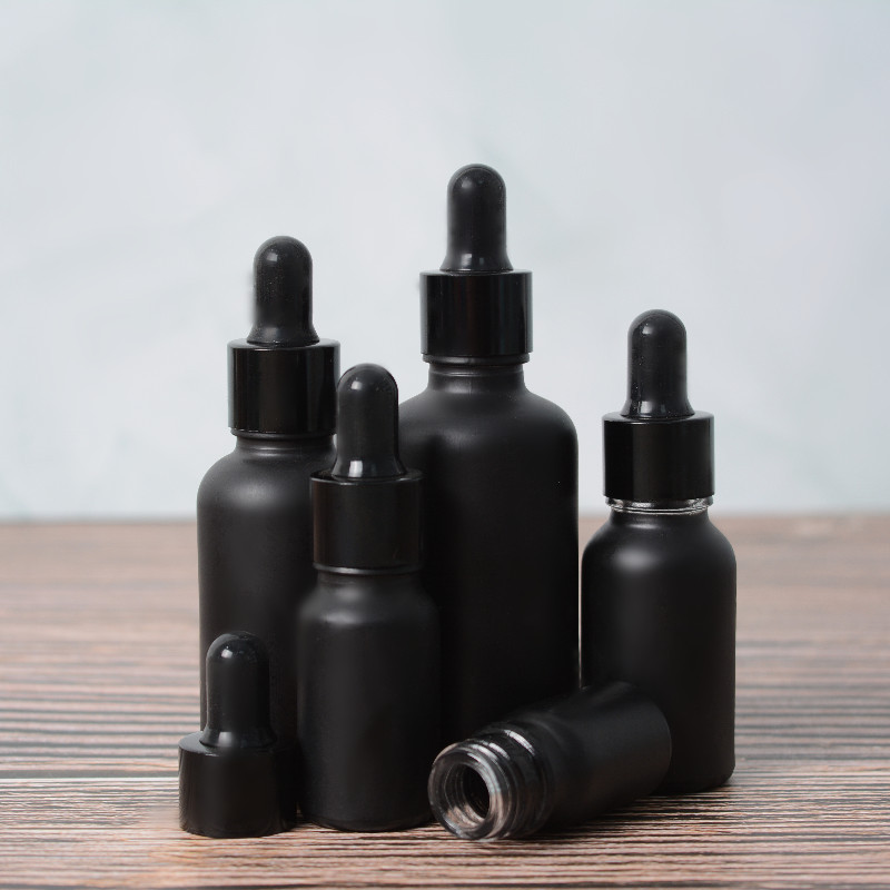 30 ml cosmetic hair essential oil bottles  frosted black glass dropper bottle