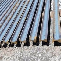 S26 60E1 rel kereta api rel kereta api baja karbon kualitas bagus ASTM R60E 55Q 38kg 43kg 60kg rel kereta api berat dijual