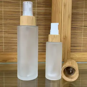En gros 15ml 30ml 50ml 100ml respectueux de l'environnement bambou top givré clair vert bleu vaporisateur en verre bouteille pour soins de la peau