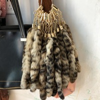 Vente en gros de porte-clés en fourrure de renard de civette véritable, design élégant, vente en gros de fourrure de renard de civette naturelle du sud