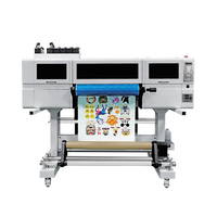 Imprimante UV DTF à trois têtes d'impression avec largeur d'impression de 600mm pour l'éducation produisant des affiches de qualité