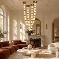 Lustre moderne de luxe en albâtre à anneaux multiples, cadre en laiton, couleur personnalisée pour hall d'hôtel, escalier, plafond haut, projet d'aménagement intérieur