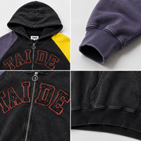 TaiDe Sweat à capuche zippé surdimensionné noir délavé sur mesure, avec appliqué universitaire et blocs de couleur, manches raglan, fabricant de vêtements OEM ODM pour hommes