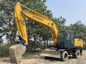 รถขุดล้อยางฮุนได 210W-7 มือสอง 21 ตัน ราคาถูก ทนทาน คุณภาพสูง เครื่องยนต์และมอเตอร์กำลังสูง 125 กิโลวัตต์ พร้อมขาย - Product Image 5