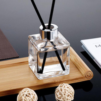 Bouteille de diffuseur en verre transparent vide carré de luxe de 100ml 200ml avec bouchon à vis