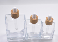 Flacon compte-gouttes en verre transparent carré pour cosmétiques fantaisie de 30 ml, 50 ml, 100 ml avec pipette en bambou