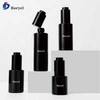Flacon compte-gouttes rond en verre 30ml 50ml 100ml pour soins de la peau, huile essentielle, sérum, noir givré, luxe, logo personnalisé, bouton poussoir
