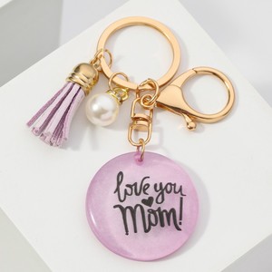 2026 New PK <b>Personalized</b> Silk Screen Printed Pearl Resin Round Brand Multi-color Tassel English Letter Waterproof <b>Keychain</b> - Product Image 5
