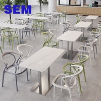 SEM Fabrik-Sonderanfertigung Kantinen- und Schnellrestaurant-Esstisch-Set mit 4 Stühlen, Gesinterter Steinplatte und Acryl-PP-Stühlen