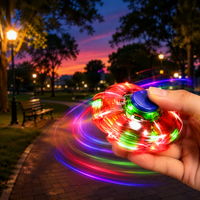 Toupie LED lumineuse transparente en gros, jouet anti-stress à presser, idéal pour les fêtes d'enfants, remplisseurs de sacs cadeaux