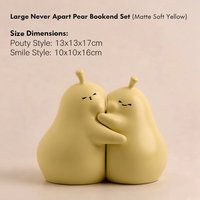 Joli ensemble d'entretoises à livres en céramique en forme de poire - Figurine de couple enlacé en jaune mat doux, organisateur de bureau créatif et décoration pour la maison et le bureau