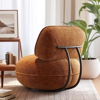 Fauteuil individuel moderne italien, style minimaliste de luxe léger, en tissu, avec pieds en bois massif et structure en fer, pour balcon, salon, bar