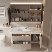 Ensemble de meuble-lavabo de salle de bain moderne de couleur crème avec vasque en céramique intégrée, miroir, armoire et coiffeuse