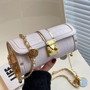 Achats sur le marché <span class=keywords><strong>en</strong></span> <span class=keywords><strong>ligne</strong></span> grossistes 2024 nouveau petit cylindre femmes pierre motif rétro chaîne unique épaule sac à bandoulière - Product Image 1