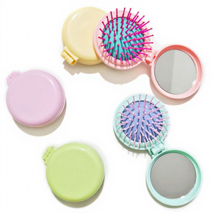 Peigne à cheveux rond pour enfants <span class=keywords><strong>et</strong></span> femmes, miroir portable pliable pour retouches <span class=keywords><strong>de</strong></span> <span class=keywords><strong>maquillage</strong></span>, houppette à coussin d'air, vente en gros disponible - Product Image 1
