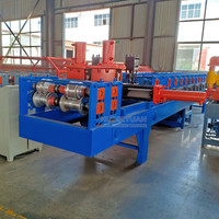 Machine de formage à froid de barres inférieures en acier galvanisé de bonne qualité pour portes à enroulement, machine de fabrication de barres inférieures en T