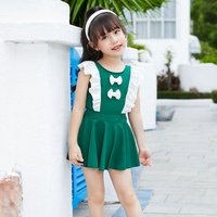 Nouveaux modèles de maillots de bain pour enfants, jupes mignonnes, couleur unie, volants, nœuds, maillots de bain une pièce, manches bouffantes pour filles, maillot de bain pour filles