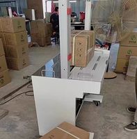 Machine d'emballage automatique de ruban PP de table, machine à cerclage automatique de boîtes en carton ondulé