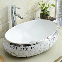 Lavabo en céramique plaqué or luxueux KD-03GBF pour salle de bain, articles sanitaires de Chaozhou, design argenté, lavabo en forme d'œuf