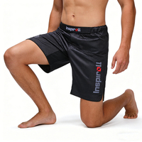 Shorts MMA 2 en 1 Shorts MMA Shorts hybrides MMA 2 en 1 - Doublure de compression intégrée pour un soutien pendant les entraînements intenses