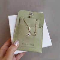 Pochette à bijoux anti-poussière de luxe en daim ivoire Talent Snap avec boîte et insert, sacs en microfibre de daim