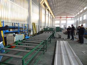 閉鎖型フロアデッキロールフォーミングマシン鋼板フロアデッキタイルロールフォーミングマシン - Product Image 5