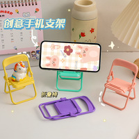 Support de téléphone portable pliable et créatif, design minimaliste, en plastique ABS flexible, couleur macaron, support paresseux pour bureau