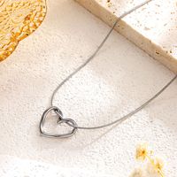 Nouveaux bijoux de mode collier d'amour torsadé exquis 18k plaqué or en acier inoxydable serpent chaîne coeur collier à breloques pour les femmes