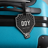 Étiquettes de voyage en gros forme personnalisée en relief étanche étiquette de bagage en caoutchouc souple avec logo nominatif