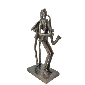 Sculpture vintage en fonte représentant un duo de saxophonistes et trompettistes abstraits, ornement décoratif pour bureau, salle d'étude, ou comme cadeau. - Product Image 4