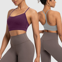 Soutien-gorge de sport pour femme en Nylon 66, couleur unie, maintien moyen, coussinets amovibles, respirant, anti-boulochage, pour le yoga, la course et le fitness