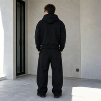 Ensemble survêtement molletonné épais noir à capuche zippée et pantalon large pour homme – Idéal pour les marques de streetwear urbain