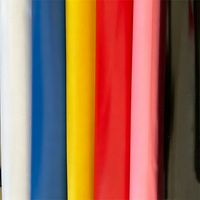 Rouleau de film PVC laminé couleur douce semi-fini, rouleau de feuille PVC transparente pour la fabrication en série de combinaisons de pluie et le collage de vêtements