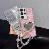Étui de téléphone de luxe élégant avec strass scintillants et miroir en forme de cœur pour Samsung Galaxy S26 Ultra S25 A55, avec dragonne en cristal