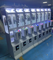 Nouvelle machine à griffes d'arcade miniature pour la vente, avec divers jouets en peluche en plastique à monnayeur, pour usage intérieur