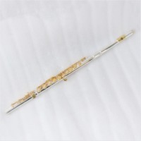 Flûte professionnelle à trou ouvert pour pied B Flûte transversale double couleur haut de gamme avec placage d'argent Beau corps en or