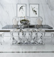 Table à manger en marbre haut de gamme de luxe moderne ensemble 6 chaises en métal gris pour cuisine et restaurant pour la maison appartement hôtel et villa