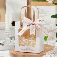 Sac en papier transparent pour cadeaux d'anniversaire et de fêtes, vente en gros, sac de remerciement avec rembourrage en papier déchiqueté