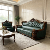 Meubles de salon de style villa classique, canapé en cuir capitonné vert foncé, cadre en fibre de verre sculpté, tables basses en marbre