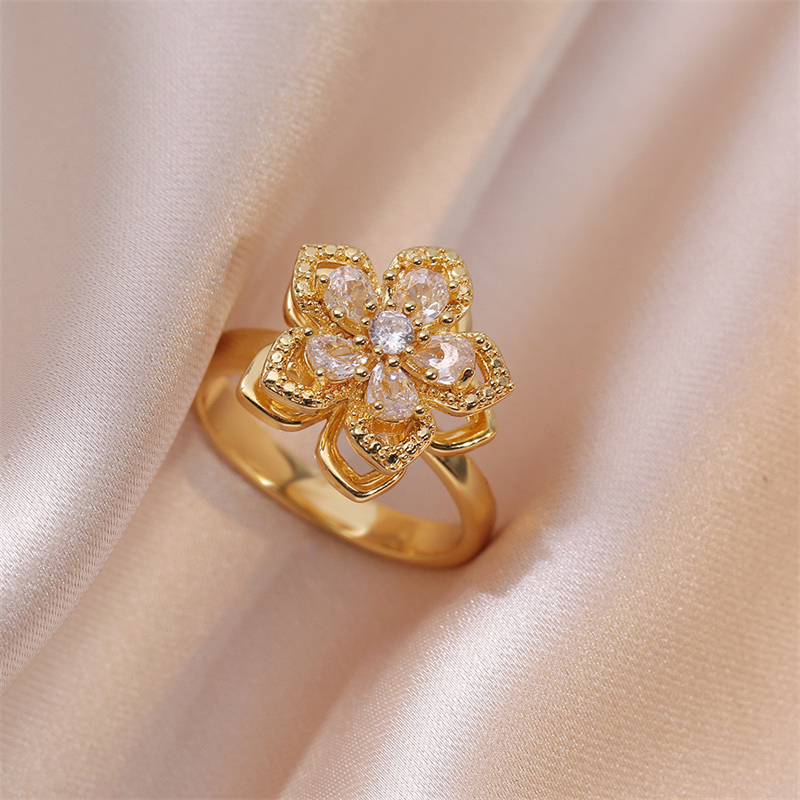 White bauhinia zircon ring