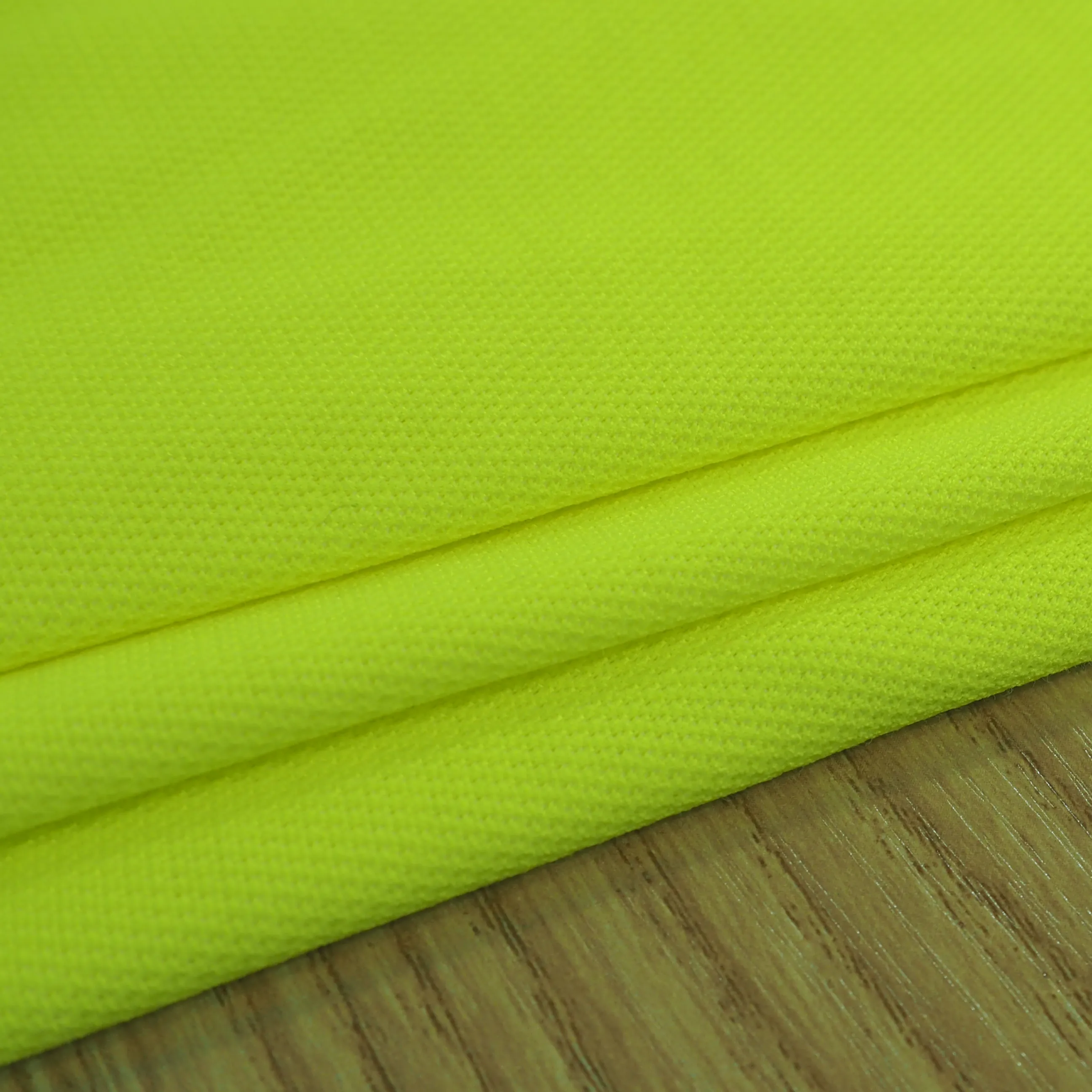 EN20471 fluorescente 100% poliestere tessuto a maglia jersey piqué con retro in cotone poliestere ad alta visibilità