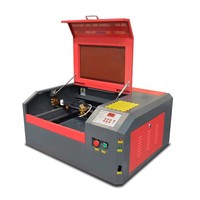 Petite machine de gravure laser bon marché pour logo 3040 4030 40w 50w CO2 machine de découpe laser cnc routeur mini découpeur laser