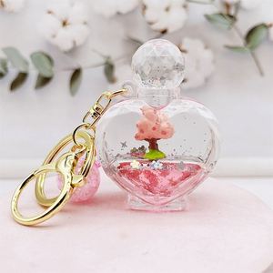 Porte-clés dessin animé cerisier et beignet, porte-clés liquide sable mouvant Sakura, pendentif de voiture, accessoires de sac, cadeaux pour enfants - Product Image 6