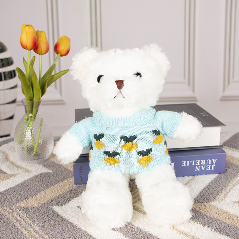 Pull bleu clair ours blanc